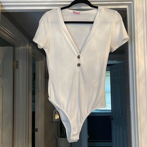 Pink lily white shirt sleeve bodysuit
